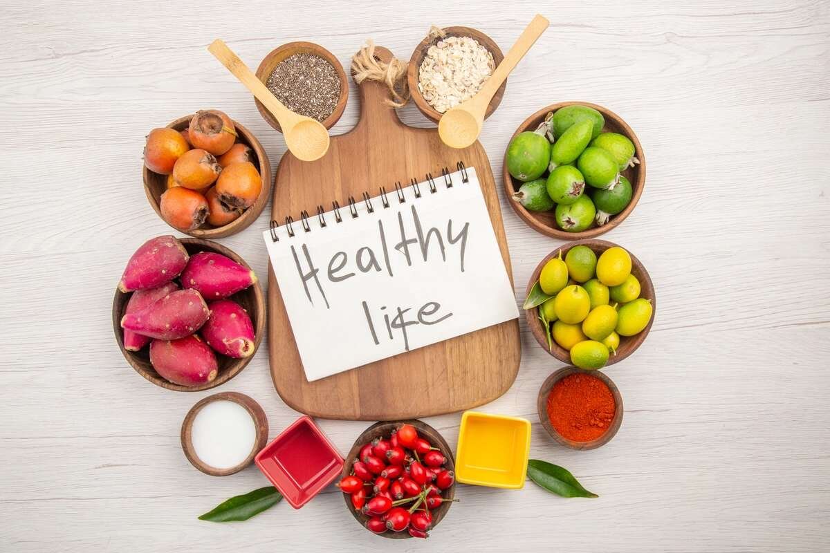 a notebook with a variety of fruits and vegetables on it